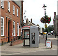 Telephone boxes in front of the Post Office in King Street, Thetford in IP24 2BU