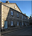 Bury St Edmunds: faded lettering on former almshouses in IP33 1QT