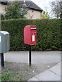 Elizabeth II postbox on Hospital Road, Bury St Edmunds in IP33 2DR