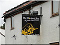 The sign of The Mustard Pot and Jero's steak house in NR19 1AA