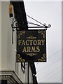 Hanging sign for the 'Factory Arms' public house in NR32 2HU