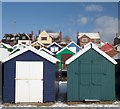 Colourful beach huts in CO5 8QT