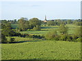 Distant view of All Saints Church, Sherbourne in CV35 8AS