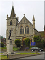 The War Memorial and United Reformed Church in RH1 6DB