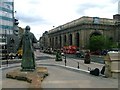 Cardinal Basil Hume looking down Neville Street towards Newcastle Central Station in NE8 2EY