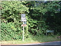 Signpost at the junction of Collendean Lane and Horsehill in RH6 0HT