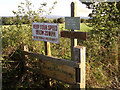 A multitude of signs on the road to Lower Exbury House, Exbury in SO45 1AE