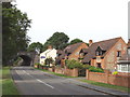 Houses and railway bridge, on B4009 at Longwick in HP27 9SF