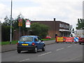 Shops and road works on Stroud Avenue, Willenhall in WV12 4ED