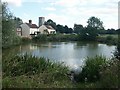 Pond and church, Mulbarton in NR14 8JU