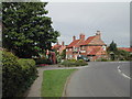 Junction of Station Road, Rolleston Village in NG23 5SW
