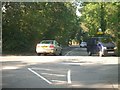 Mini-roundabout in Fairmile Lane in KT11 2SF