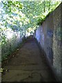 Footpath leading to Grange Road in KT21 2QH
