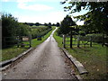 Entrance to private road leading across Leatherhead Downs to Cherkley Court in KT22 8FD