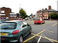 Busy road junction in Melton in LE13 0JF