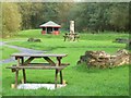 Picnic tables at Mynydd Mawr Woodland Park in Tumble