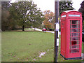 Red telephone box alongside Woodlands Road, New Forest in SO40 7GH