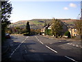 Crossroads of Meltham Road with Stubbin Road and Carrs Road in HD7 6JG