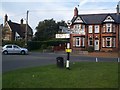 Signpost at Wrenbury by Nantwich Road/Station Road junction in CW5 8HB