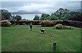 Garden of Duisdale Hotel, Duisdale, Isle of Skye, with Sound of Sleat in background in IV43 8QW