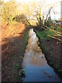 Brook running under Hough Lane in M29 8SJ