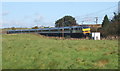 Southbound train near Boards Farm in IP14 4PD