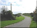 Approaching the bridge over the A55 in Trewalchmai Community