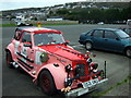 Car park with unusual parked car in SA64 0JT