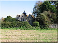 View of Fishbourne church from footpath in PO19 3JD