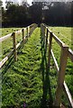 Fenced footpath in TN12 7AT
