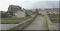 View westwards across the old bridge towards the village of Aberffraw in LL63 5LX
