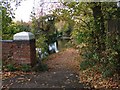 Footpath leading from Pondtail Road bridge down to Basingstoke Canal in GU51 3DT