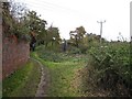 Remains of M&SWJ bridge over the Thames & Severn Canal in Siddington