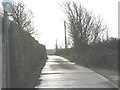Concrete road leading to Glan Gors Holiday Cottages in LL63 5RS