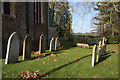 Gravestones in St Peter's churchyard in CB9 7JH