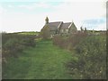 Approaching St Peulan's Church from the east in LL65 4ST