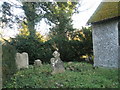 Rear of the churchyard at St Peter, East Marden in PO18 9JE