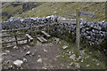 Path junction and stile above Dry Valley in Malham
