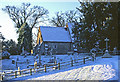 St Nicholas, Pyrford, in snow in GU22 8UA