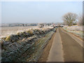 View north along a frosty New Road in NR10 5AX