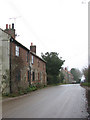 View east along The Street in Baconsthorpe