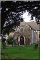 Porch and churchyard, St. Thomas a Becket's church, Shirenewton in Shirenewton