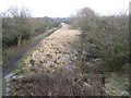 Path by disused canal near Willow Bank Farm in OL7 9JZ