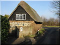 Thatched property on junction of Saunders Lane with Sandwich Road in CT3 2AN