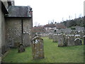 Looking from the churchyard towards the rectory at West Dean in PO18 0RB