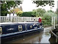 Narrow boat passing through Sheffield Bottom Swing Bridge in RG7 4PN