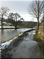 Icy and muddy tow-path in LS18 4GP