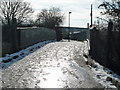 Glade Lane looking towards foot bridge over the Brentford Branch Line in UB2 4RQ