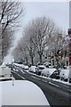 Snow on cars - the kind of snow that's good for making snowballs in N4 4EL