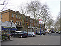 Parking area and shops, Kew Gardens Station in TW9 2EQ